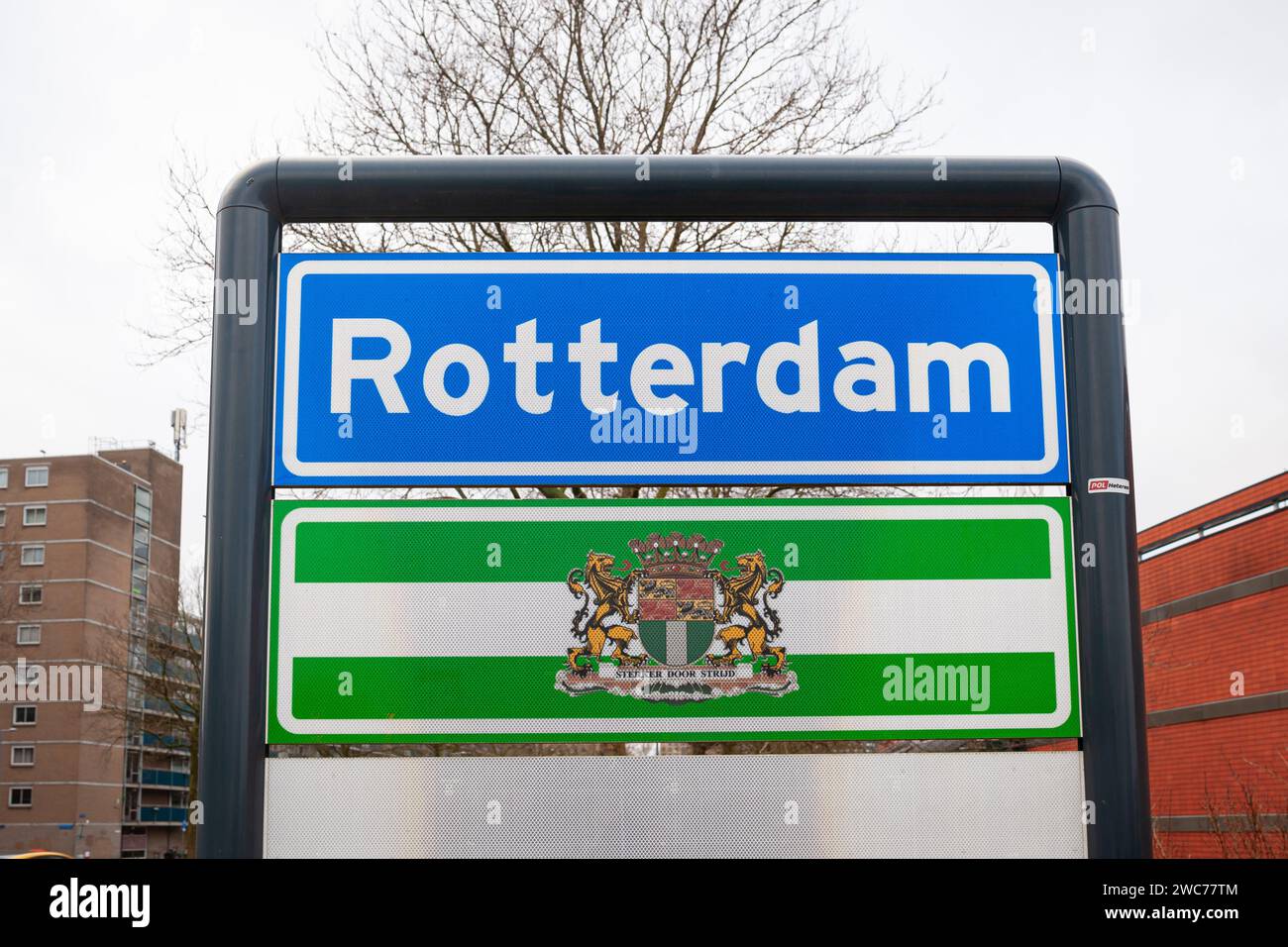 Rotterdam, Netherlands January 12, 2024 Place name sign and coat of