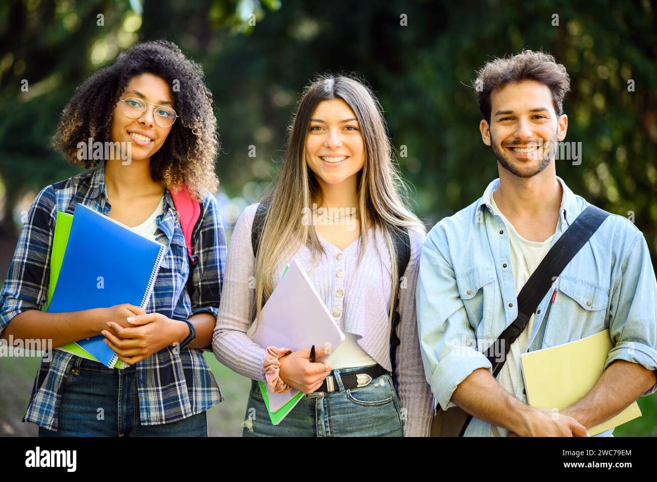 Happy multiethnic group of students smiling outdoor Stock Photo