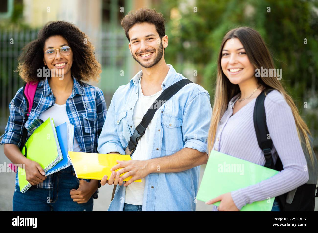 Happy multiethnic group of students smiling outdoor Stock Photo