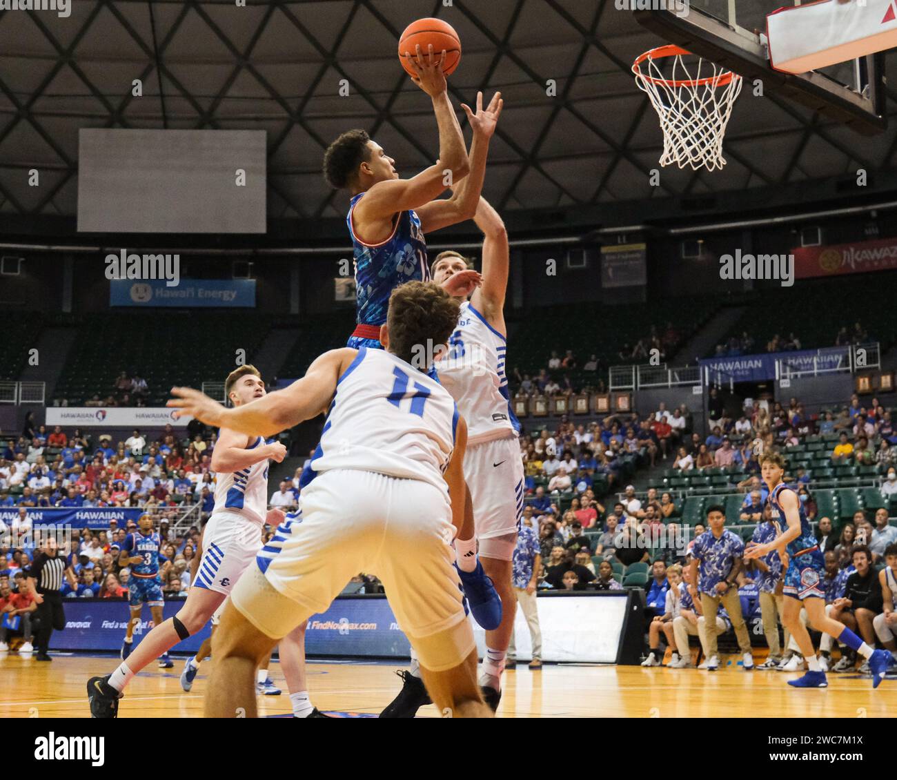 November 20, 2023 Kansas guard Kevin McCuller Jr. (15) drives to the