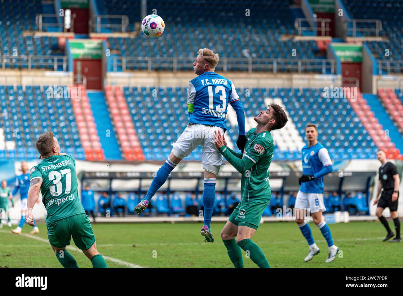 Rostock, Deutschland 14. Januar 2024: Testspiel - 2023/2024 - FC Hansa Rostock vs. VfB Lübeck Im Bild: v. li. im Zweikampf Kevin Schumacher (Hansa Rostock) und Felix Ruschke (Hansa Rostock) Stock Photo