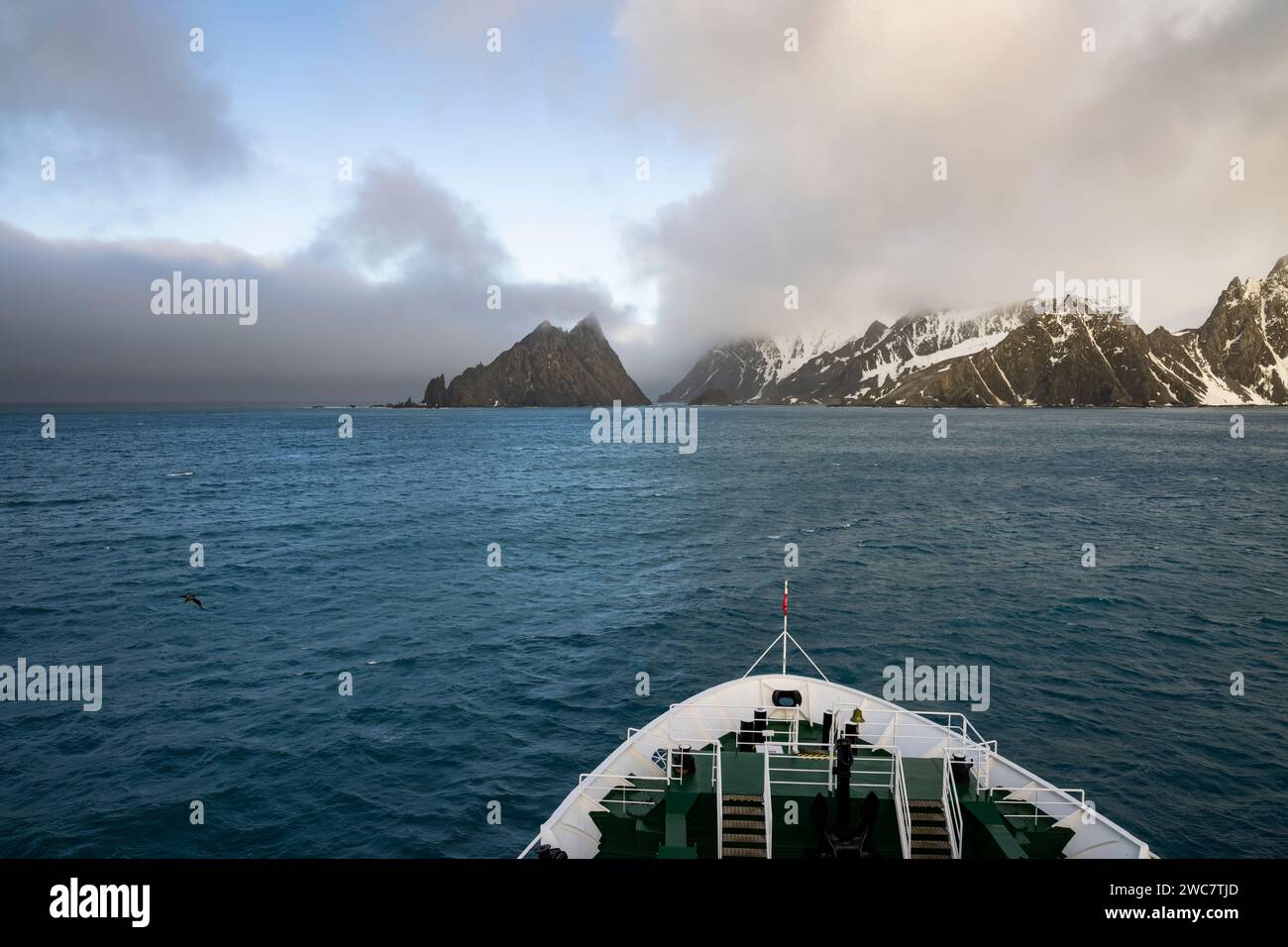 Forecastle of Gadventures Expedition ship approaching Elephant Island ...