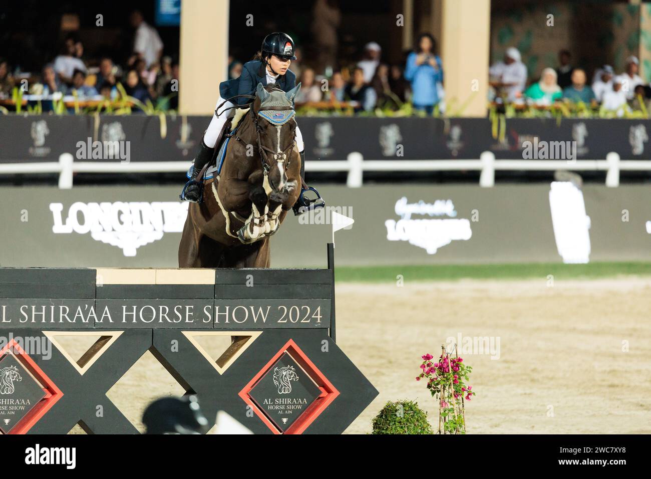 Gold and Shooting Club, UAE. 14 January, 2024. Aya Hamcho of Syrian Arab Republic with Zef during the CSI4*-W - Longines Al Shira’aa FEI Jumping World Cup™ Gand Prix at the Al Shira'aa Horse Show on January 14, 2024, Al Ain Equestrial, Gold and Shooting Club, United Arabe Emirates (Photo by Maxime David - MXIMD Pictures) Credit: MXIMD Pictures/Alamy Live News Stock Photo