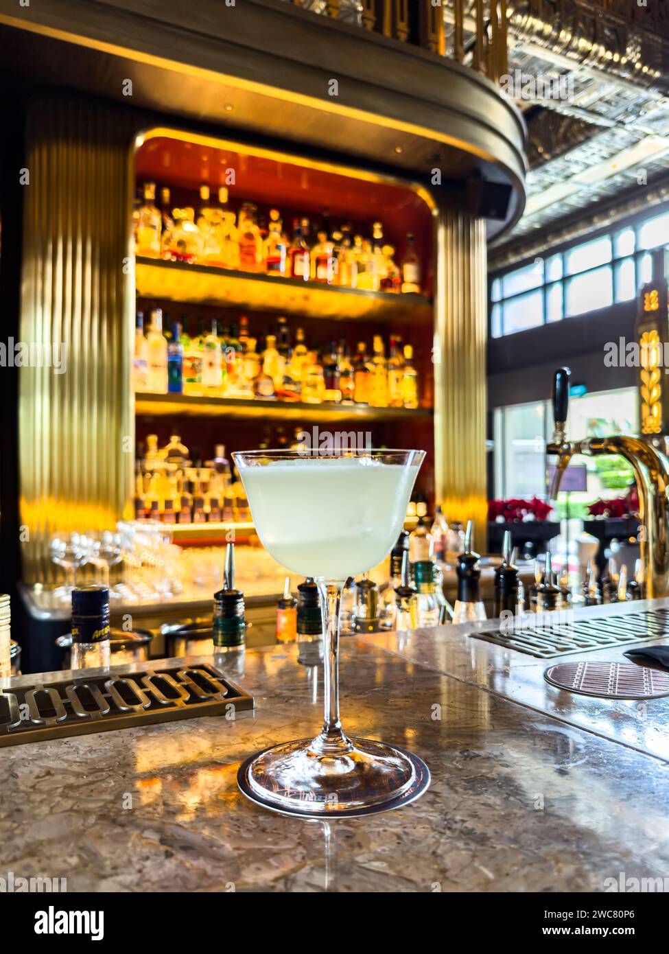 The Atlas Bar in the Parkview Square building in downtown Singapore ranks no 48 in the world Stock Photo