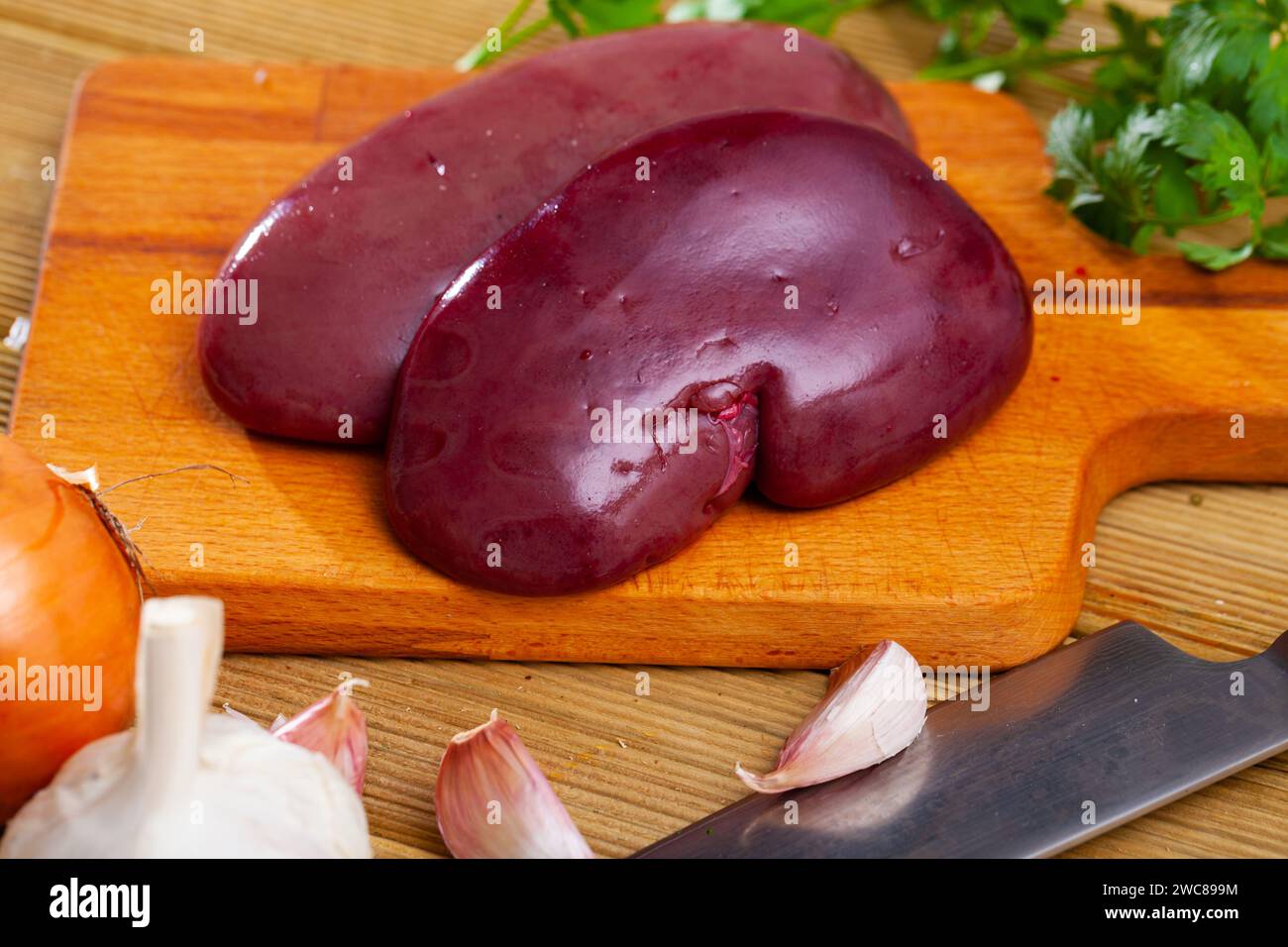 Raw pork kidneys with seasonings Stock Photo Alamy