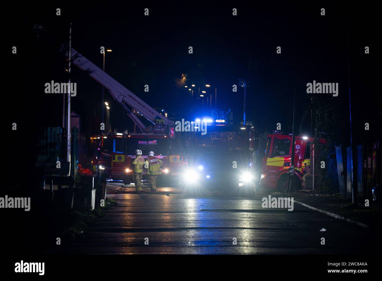 Newport, UK. 14th January 2024.   Firefighters battle to put the fire out at the Wern Industrial Estate in Rogerstone in Wales on 14th January 2024.   This image may only be used for Editorial purposes. Editorial use only.  Credit: Ashley Crowden/Alamy Live News Stock Photo