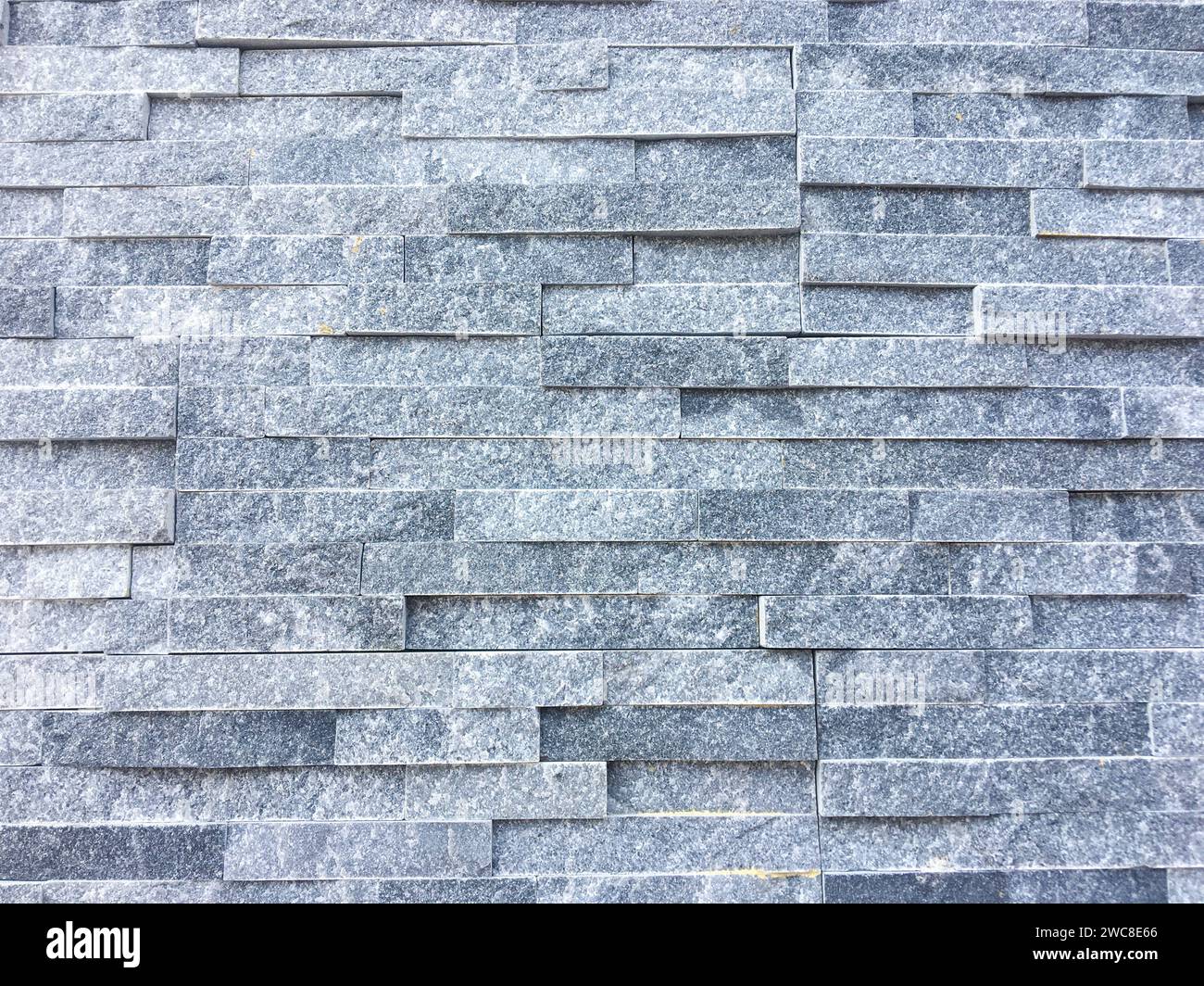 Dark concrete texture with a crumpled paper backdrop Stock Photo