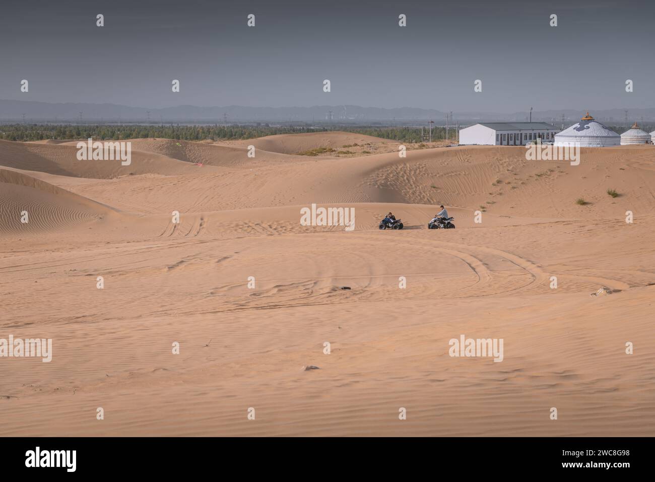 OCTOBER 2, 2022, BAOTOU, CHINA: Traditional Mongolian yurts in the desert of Inner Mongolia, China. Copy space for text, background Stock Photo