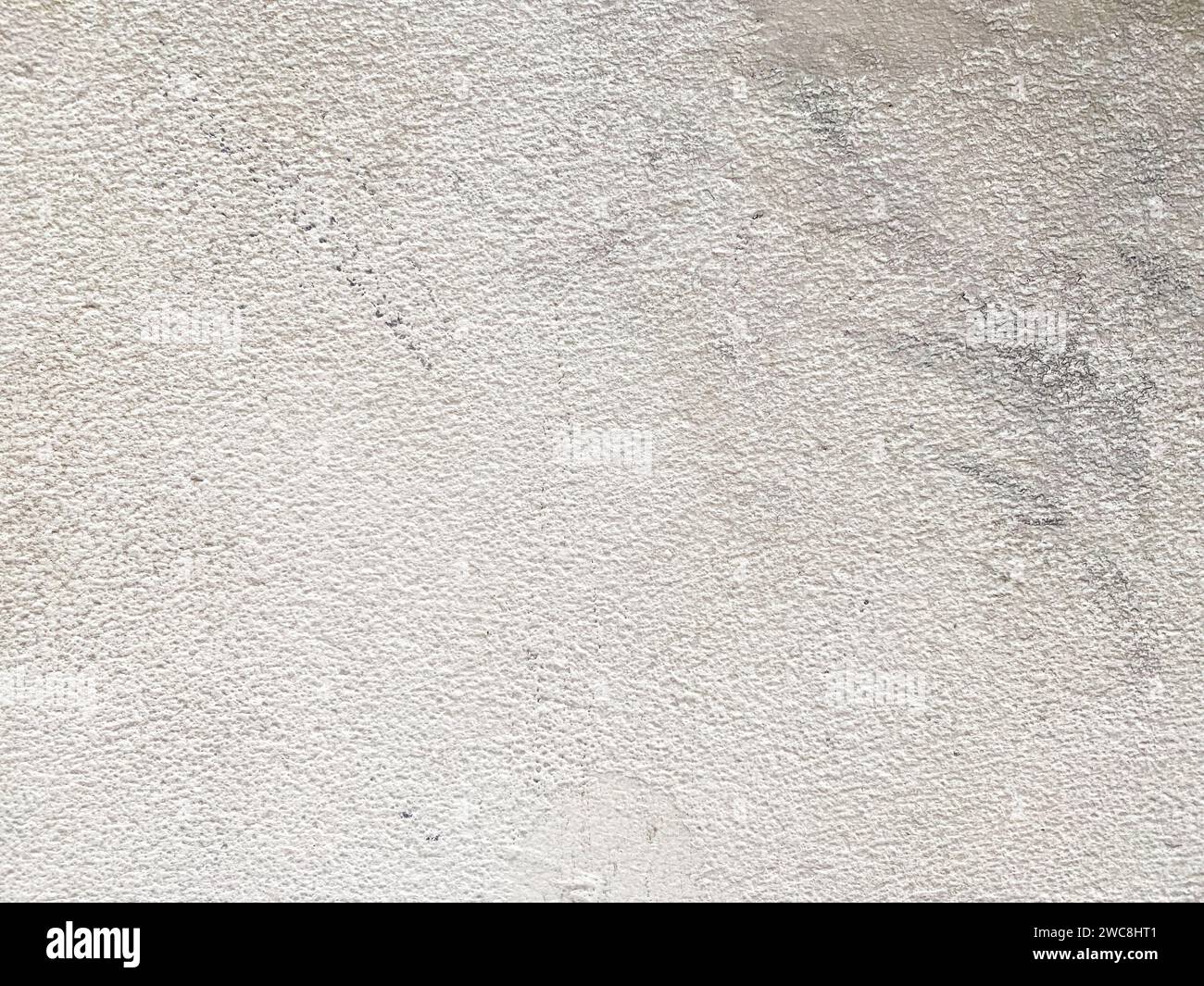 The rough surface of the concrete creates an interesting visual pattern. Stock Photo