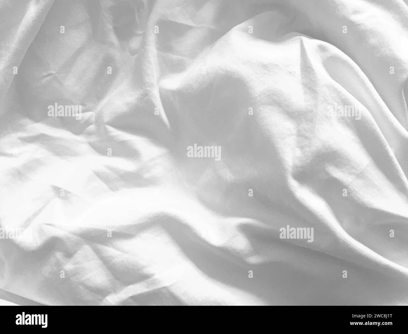 The line and pattern of this silky, white fabric create a visually appealing texture, enhancing the overall aesthetic and providing a sense of sophist Stock Photo