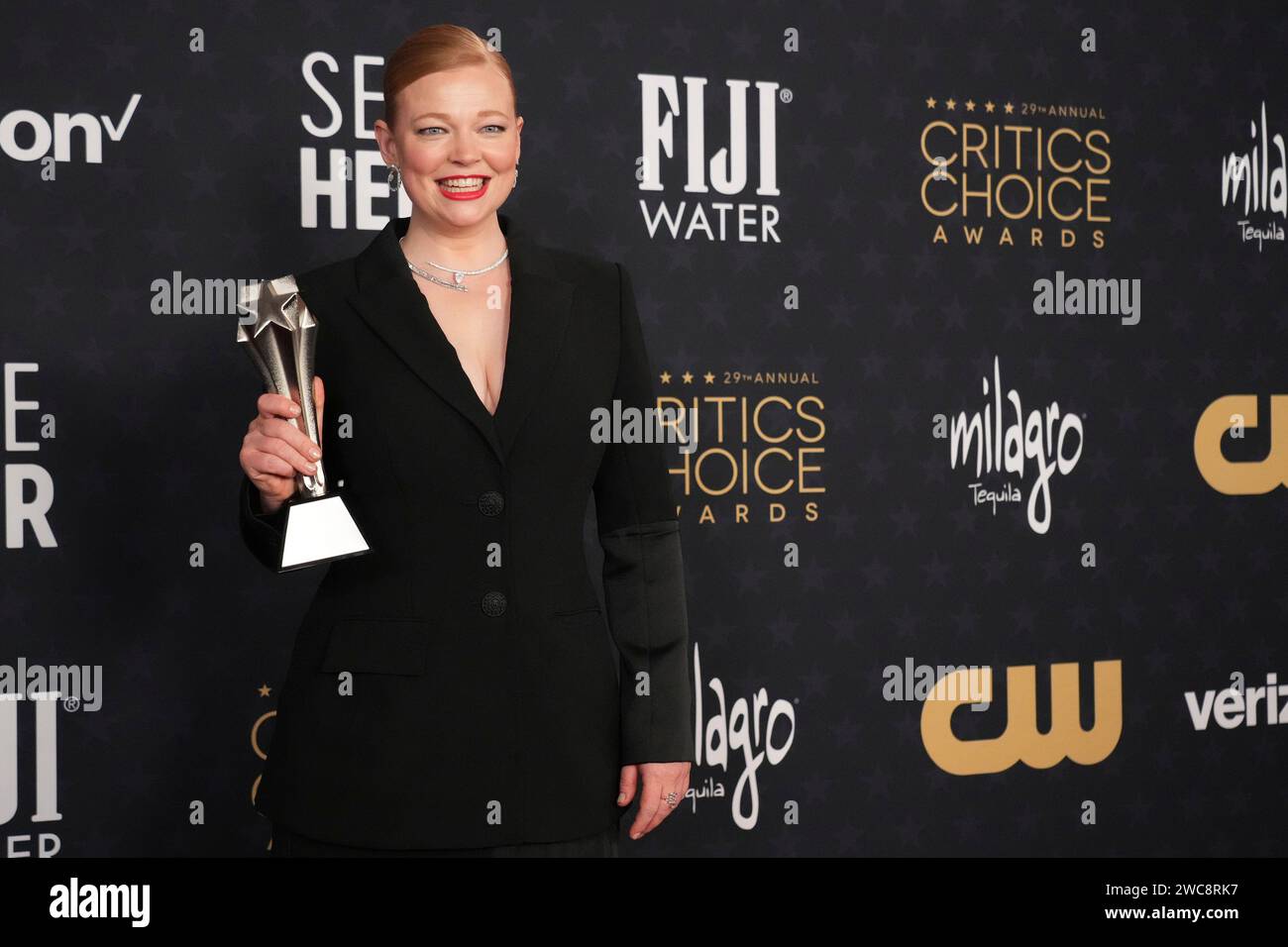 Sarah Snook poses in the press room with the award for best actress in