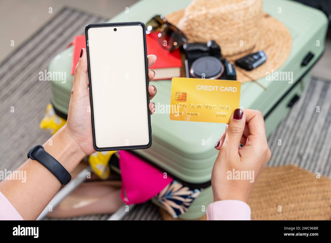 Preparing a credit card for travel Stock Photo