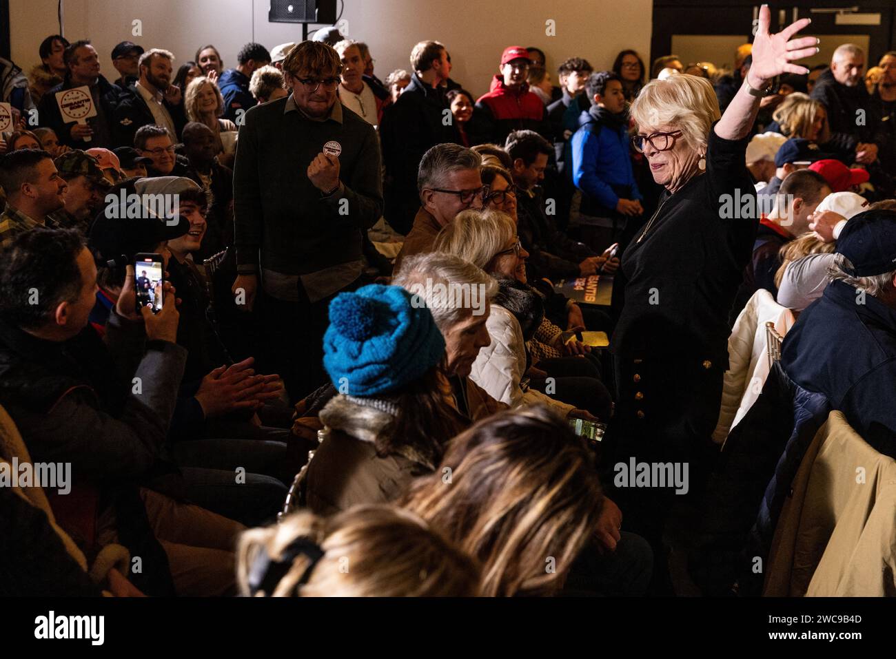 Ankeny, United States. 14th Jan, 2024. People dance before a campaign event for Republican