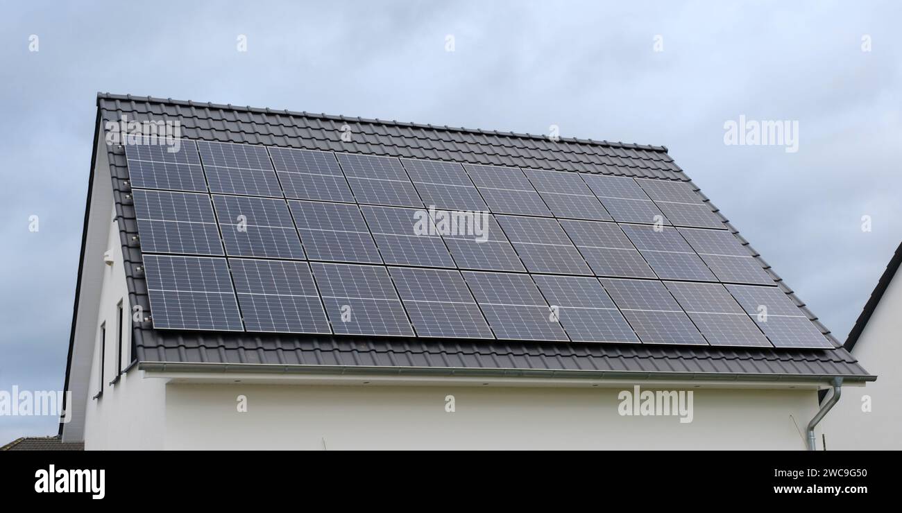 Roof of a new building with Photovoltaics Stock Photo - Alamy