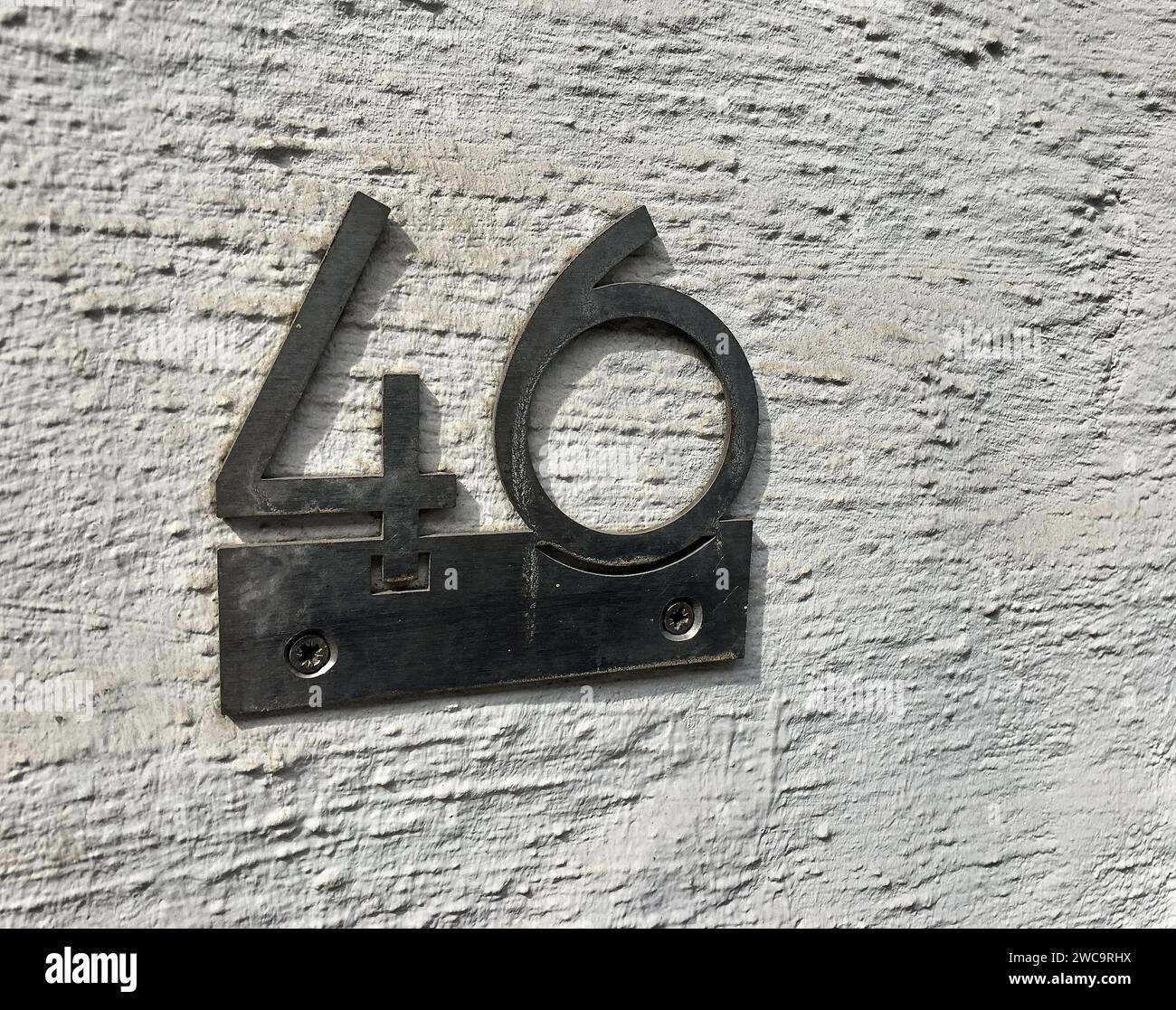 Close up of an house door number 46 Stock Photo