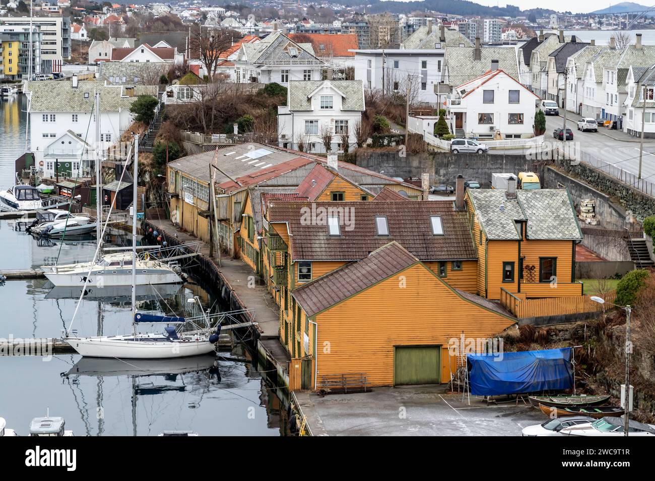 High viewpoint from Risøy broen (bridge) looking at the waterway and buildings.  Haugesund, Norway Stock Photo