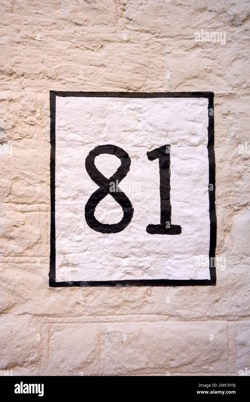 Close up of an house door number 81 Stock Photo