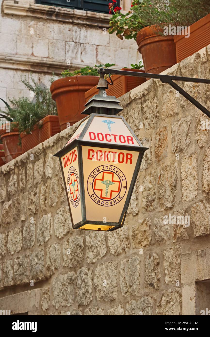 Lamp illuminating Doctor's sign, Dubrovnok Stock Photo