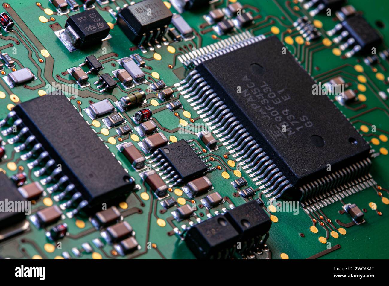 Parts of a circuit board that is installed in a CNC control Stock Photo