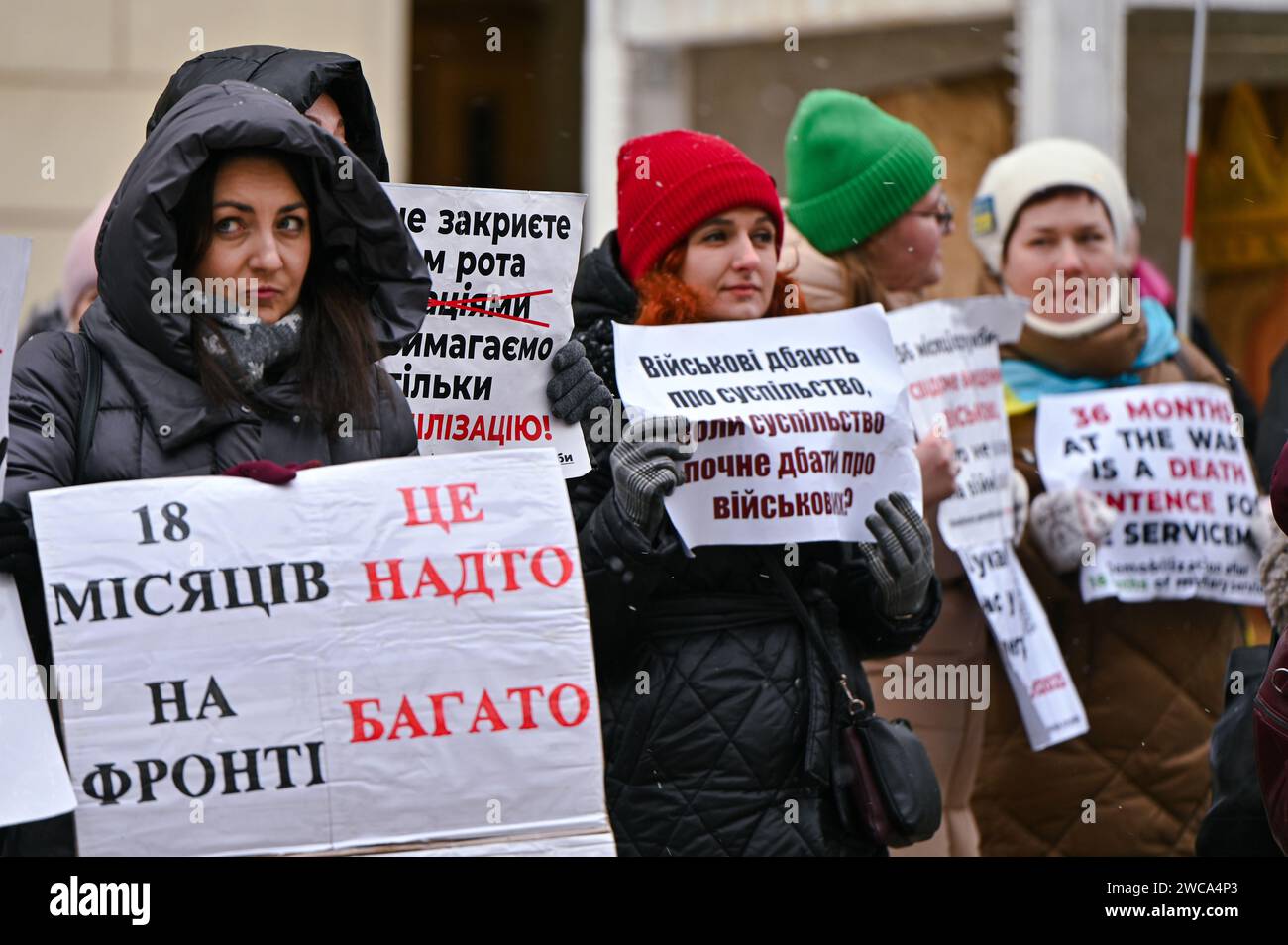 LVIV, UKRAINE - JANUARY 14, 2024 - Wives and relatives of Ukrainian soldiers rally outside the Lviv City Council to demand the authorities pass a law that would give defenders the right to demobilize after 18 months of service, Lviv, western Ukraine. Stock Photo