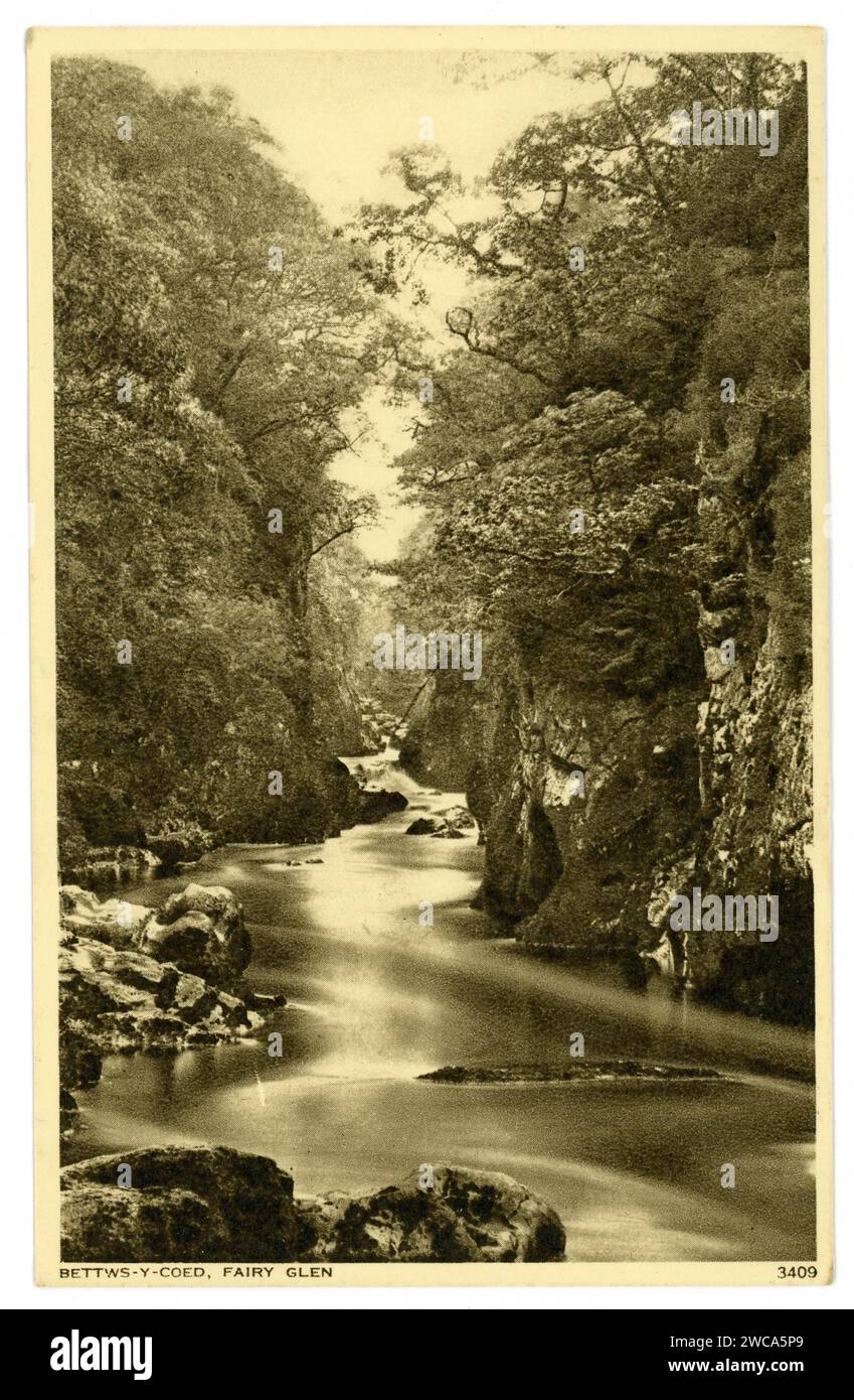 Original Edwardian era postcard of Betws y Coed Fairy Glen, beauty spot, Snowdonia National Park, Wales, UK. Circa 1905 / 1910. Stock Photo