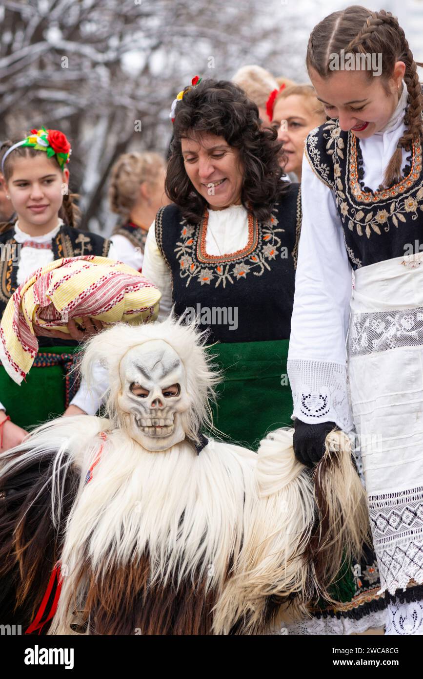 Little child in scary costume at the Surva International Masquerade and Mummers Festival in Pernik, Sofia Region, Bulgaria, Eastern Europe, Balkans EU Stock Photo