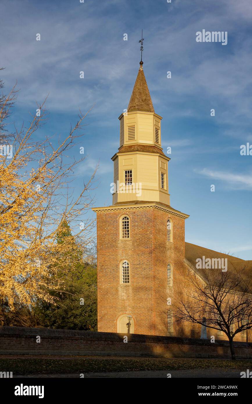 Bruton Parish Church, steeple, brick, wall, trees, religious building, golden hour light, autumn leaves, 1715, colonial, restored 1939, Virginia; Will Stock Photo