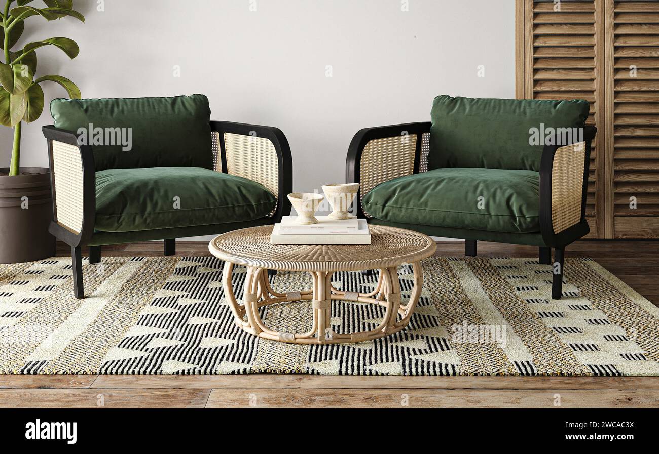 Boho chic living area with rattan coffee table and plush green armchairs on a geometric rug Stock Photo