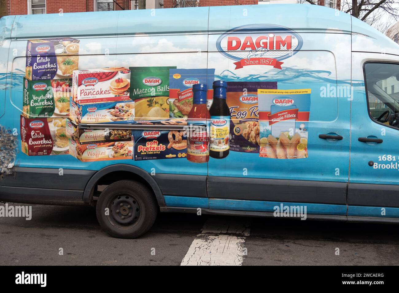 A delivery truck from Dagim a company that sells kosher food, primarily frozen fish. Delivering here to  supermarket in Williamsburg, Brooklyn. Stock Photo