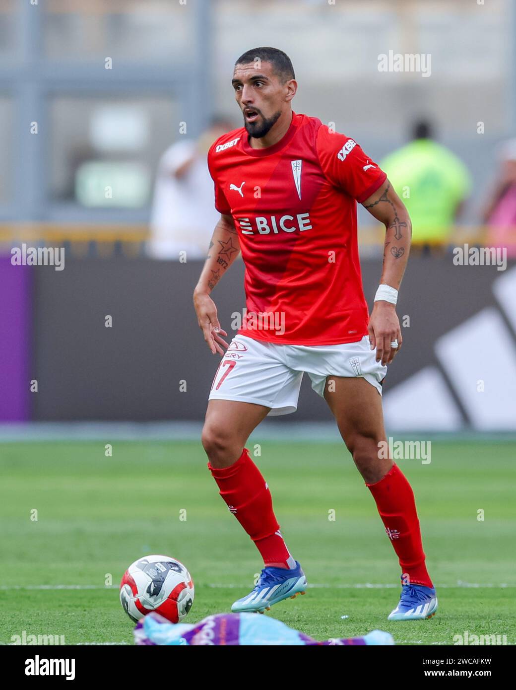 Lima, Peru. 14th Jan, 2024. Branco Ampuero of Universidad Catolica during the friendly match between Sporting Cristal and Universidad Catolica de Chile played at Nacional Stadium on January 14, 2024 in Lima, Peru. (Photo by Miguel Marrufo/PRESSINPHOTO) Credit: PRESSINPHOTO SPORTS AGENCY/Alamy Live News Stock Photo