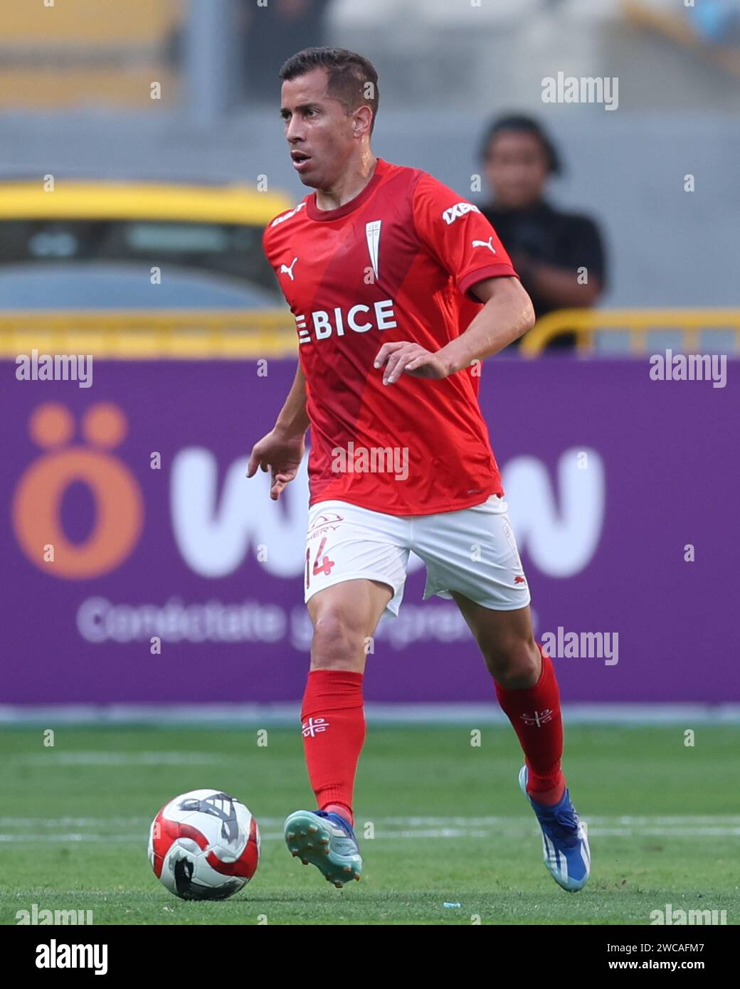 Lima, Peru. 14th Jan, 2024. Agustin Farias of Universidad Catolica during the friendly match between Sporting Cristal and Universidad Catolica de Chile played at Nacional Stadium on January 14, 2024 in Lima, Peru. (Photo by Miguel Marrufo/PRESSINPHOTO) Credit: PRESSINPHOTO SPORTS AGENCY/Alamy Live News Stock Photo