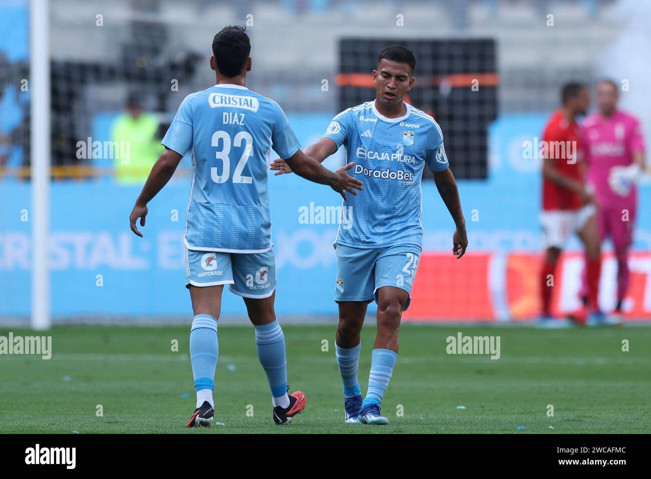 Lima, Peru. 14th Jan, 2024. Leonardo Diaz and Martin Tavara of Sporting Cristal celebrating goal during the friendly match between Sporting Cristal and Universidad Catolica de Chile played at Nacional Stadium on January 14, 2024 in Lima, Peru. (Photo by Miguel Marrufo/PRESSINPHOTO) Credit: PRESSINPHOTO SPORTS AGENCY/Alamy Live News Stock Photo