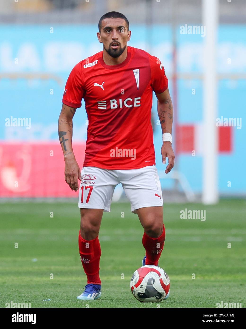 Lima, Peru. 14th Jan, 2024. Branco Ampuero of Universidad Catolica during the friendly match between Sporting Cristal and Universidad Catolica de Chile played at Nacional Stadium on January 14, 2024 in Lima, Peru. (Photo by Miguel Marrufo/PRESSINPHOTO) Credit: PRESSINPHOTO SPORTS AGENCY/Alamy Live News Stock Photo
