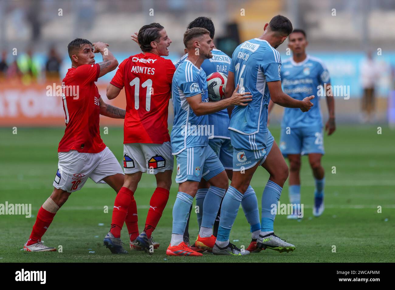 Lima, Peru. 14th Jan, 2024. Cesar Pinares and Ignacio Da Silva during the friendly match between Sporting Cristal and Universidad Catolica de Chile played at Nacional Stadium on January 14, 2024 in Lima, Peru. (Photo by Miguel Marrufo/PRESSINPHOTO) Credit: PRESSINPHOTO SPORTS AGENCY/Alamy Live News Stock Photo