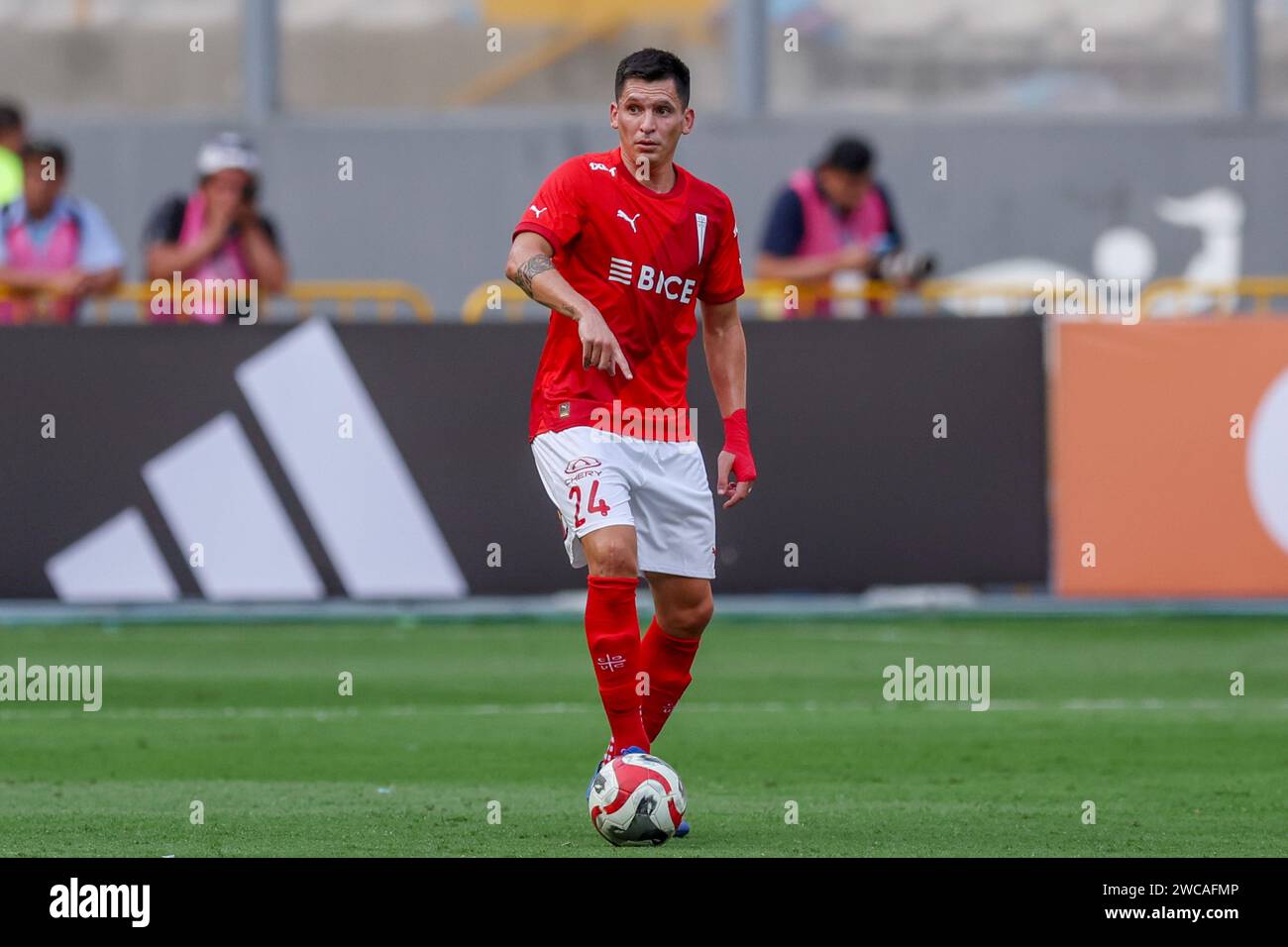 Lima, Peru. 14th Jan, 2024. Alfonso Parot of Universidad Catolica during the friendly match between Sporting Cristal and Universidad Catolica de Chile played at Nacional Stadium on January 14, 2024 in Lima, Peru. (Photo by Miguel Marrufo/PRESSINPHOTO) Credit: PRESSINPHOTO SPORTS AGENCY/Alamy Live News Stock Photo