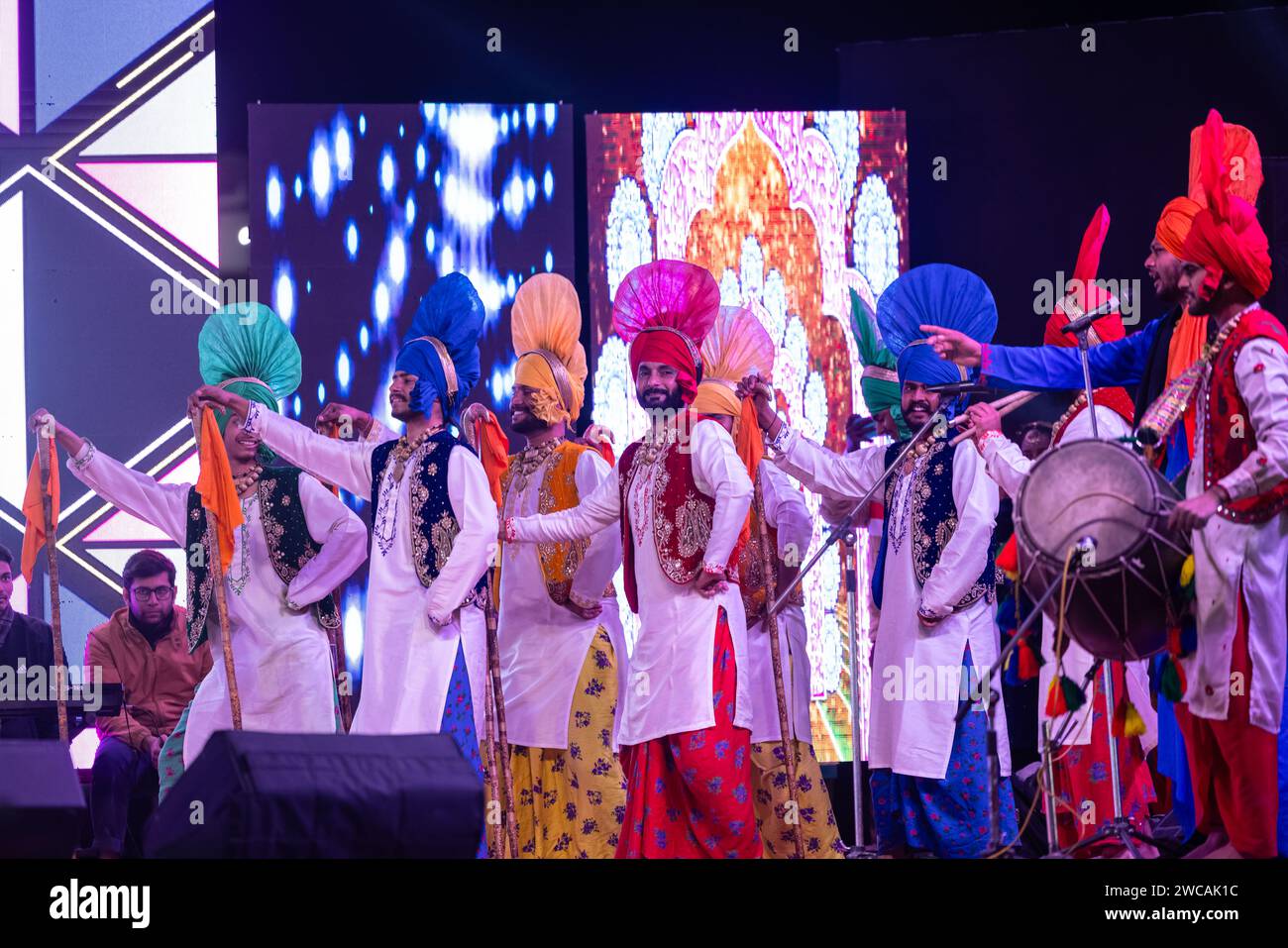 Group of punjabi artists from punjab performing bhangra dance in