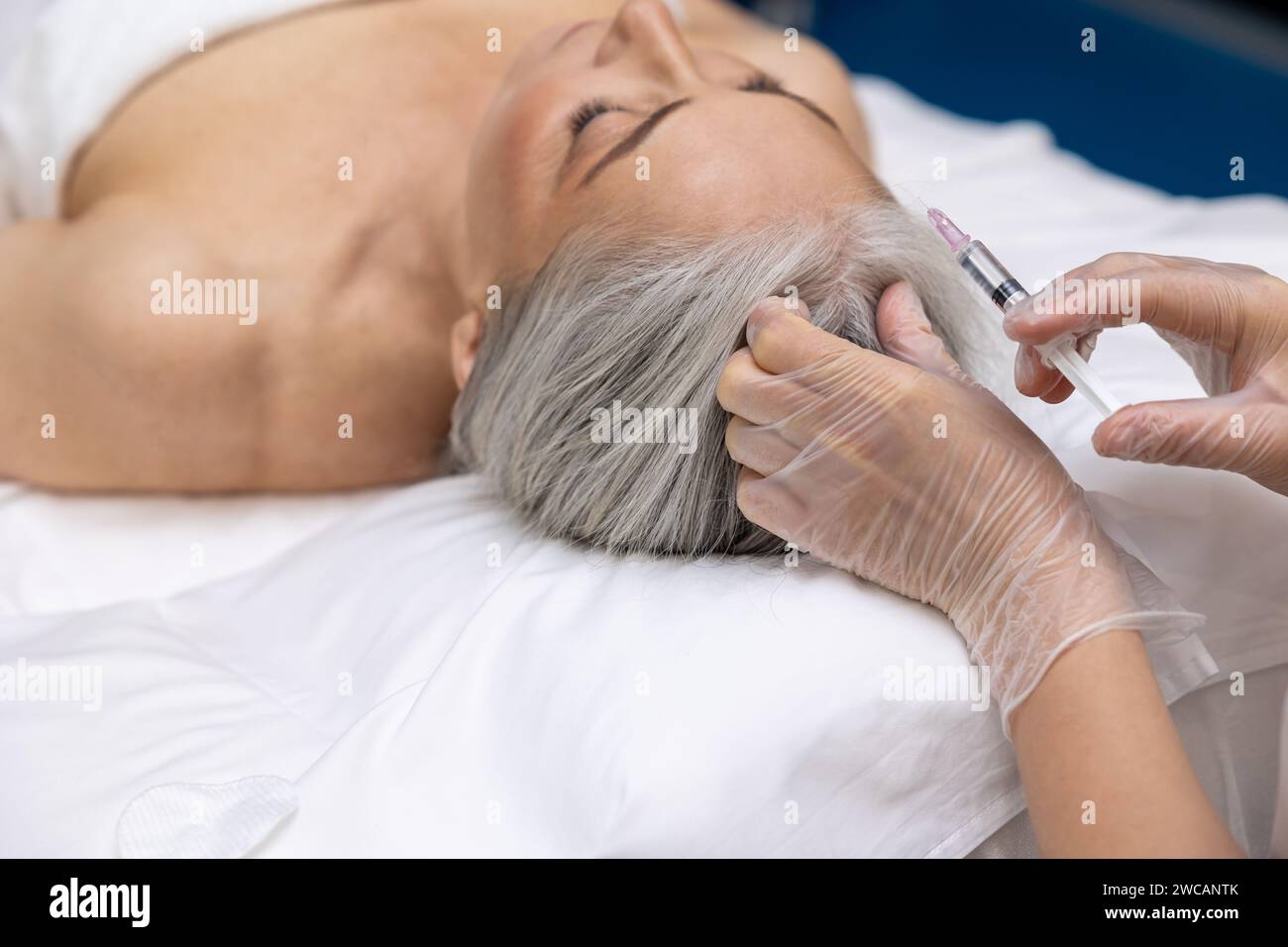 Doctor syringe filler injections hi-res stock photography and images ...