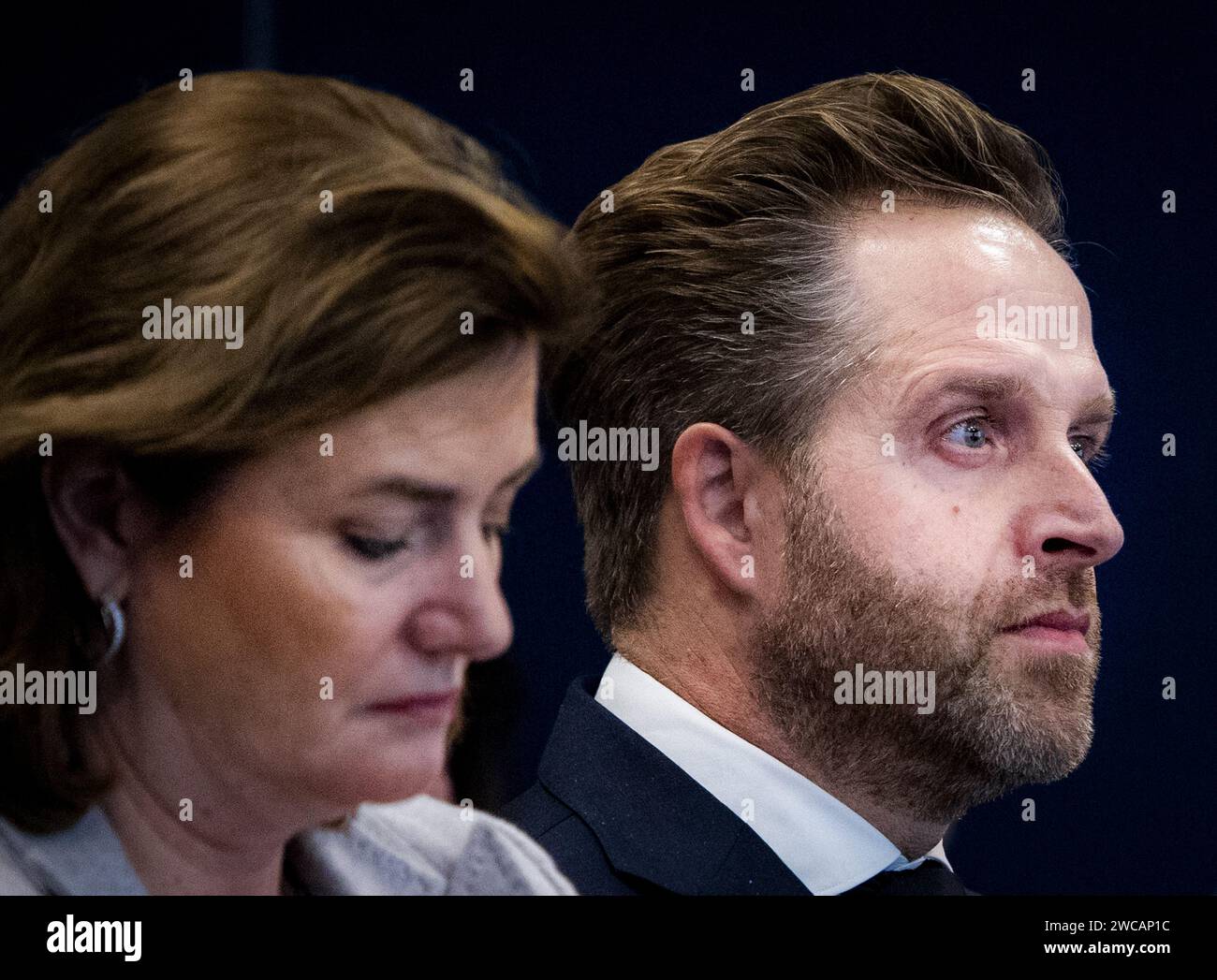 The Hague, Netherlands. 15 January, 2024. Karien van Gennip, outgoing Minister of Social Affairs and Employment, and Hugo de Jonge, outgoing Minister of the Interior and Kingdom Relations, during the presentation of the report to the cabinet and the House of Representatives on behalf of the State Commission for Demographic Developments 2050. The report examines the effects of, among other things, an aging population and migration. ANP RAMON VAN FLYMEN netherlands out - belgium out Credit: ANP/Alamy Live News Stock Photo