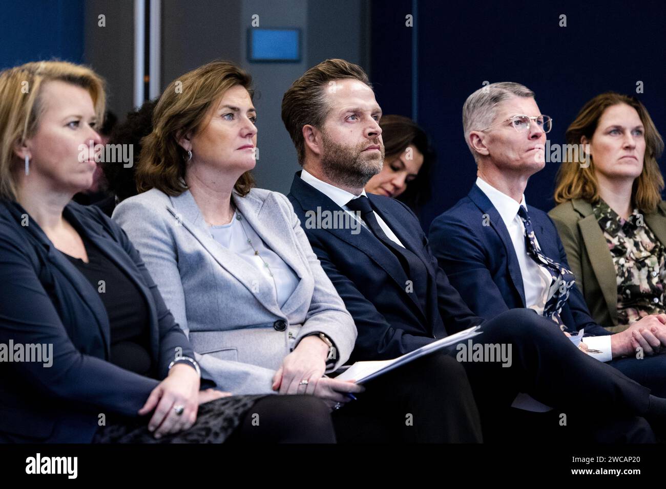 The Hague, Netherlands. 15 January, 2024. Karien van Gennip, outgoing Minister of Social Affairs and Employment, and Hugo de Jonge, outgoing Minister of the Interior and Kingdom Relations, during the presentation of the report to the cabinet and the House of Representatives on behalf of the State Commission for Demographic Developments 2050. The report examines the effects of, among other things, an aging population and migration. ANP RAMON VAN FLYMEN netherlands out - belgium out Credit: ANP/Alamy Live News Stock Photo