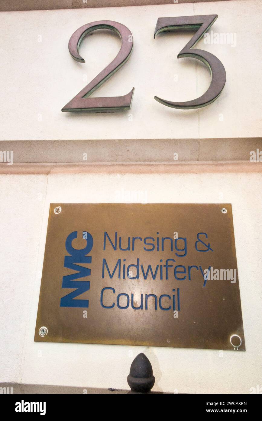 Brass name plate / plaque outside the offices of The Nursing and Midwifery Council – NMC at 23 Portland Place London W1B 1PZ. UK. (137) Stock Photo