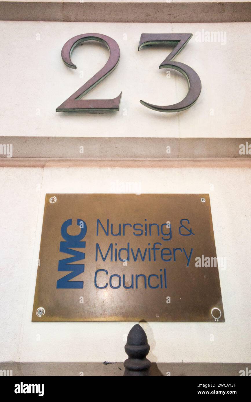 Brass name plate / plaque outside the offices of The Nursing and Midwifery Council – NMC at 23 Portland Place London W1B 1PZ. UK. (137) Stock Photo