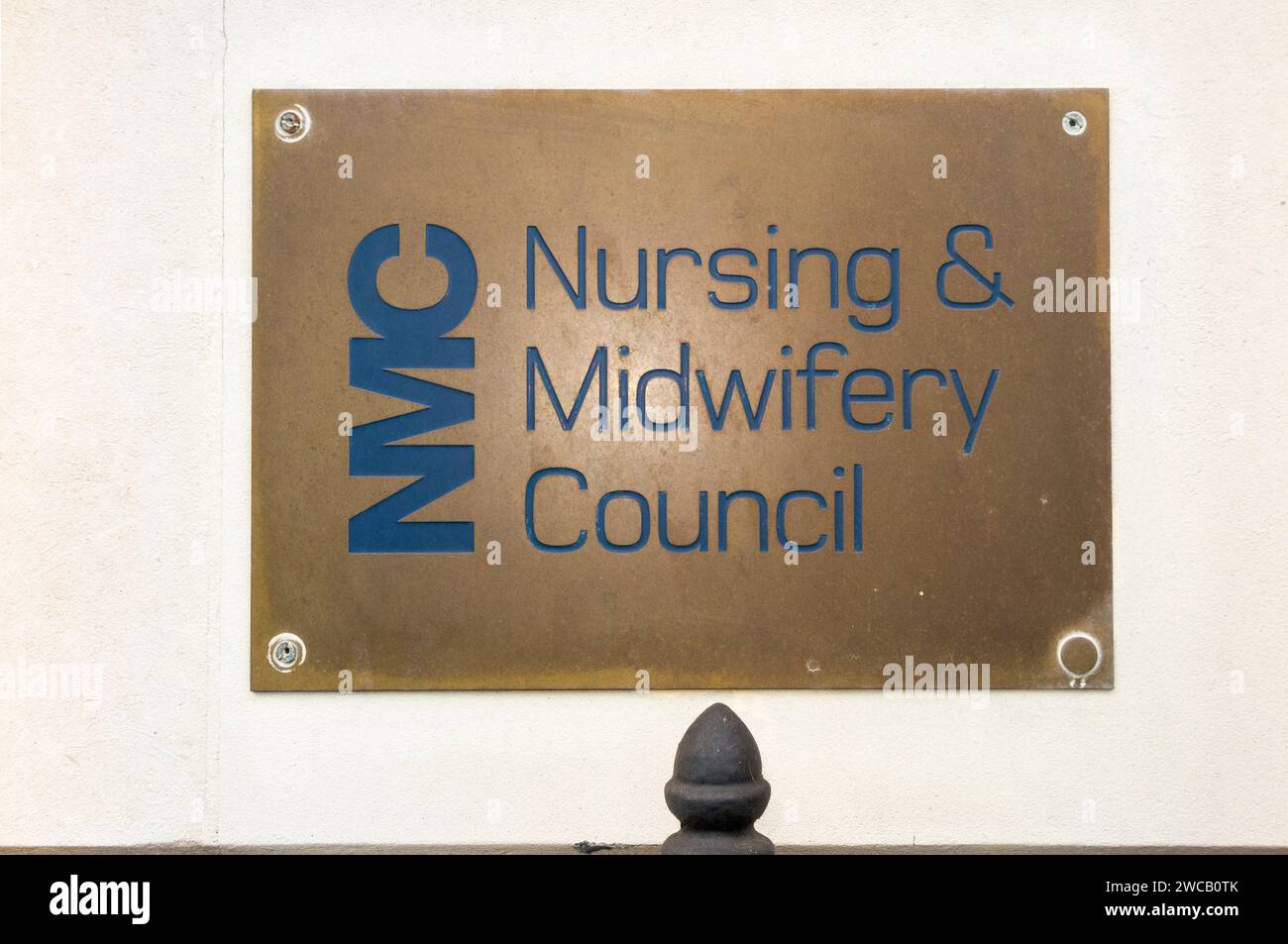 Brass name plate / plaque outside the offices of The Nursing and Midwifery Council – NMC at 23 Portland Place London W1B 1PZ. UK. (137) Stock Photo