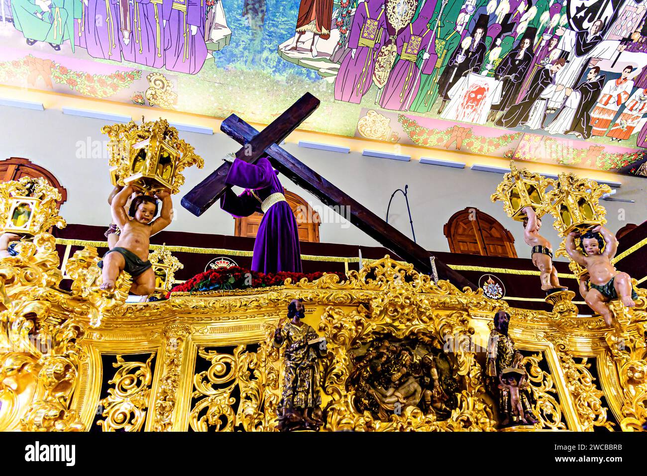 Malaga, Andalusia, Spain; April 4, 2023: Holy Week, passage of the Most Holy Virgin Mary of Hope and passage of the Sweet Name of Jesus, in the Basili Stock Photo