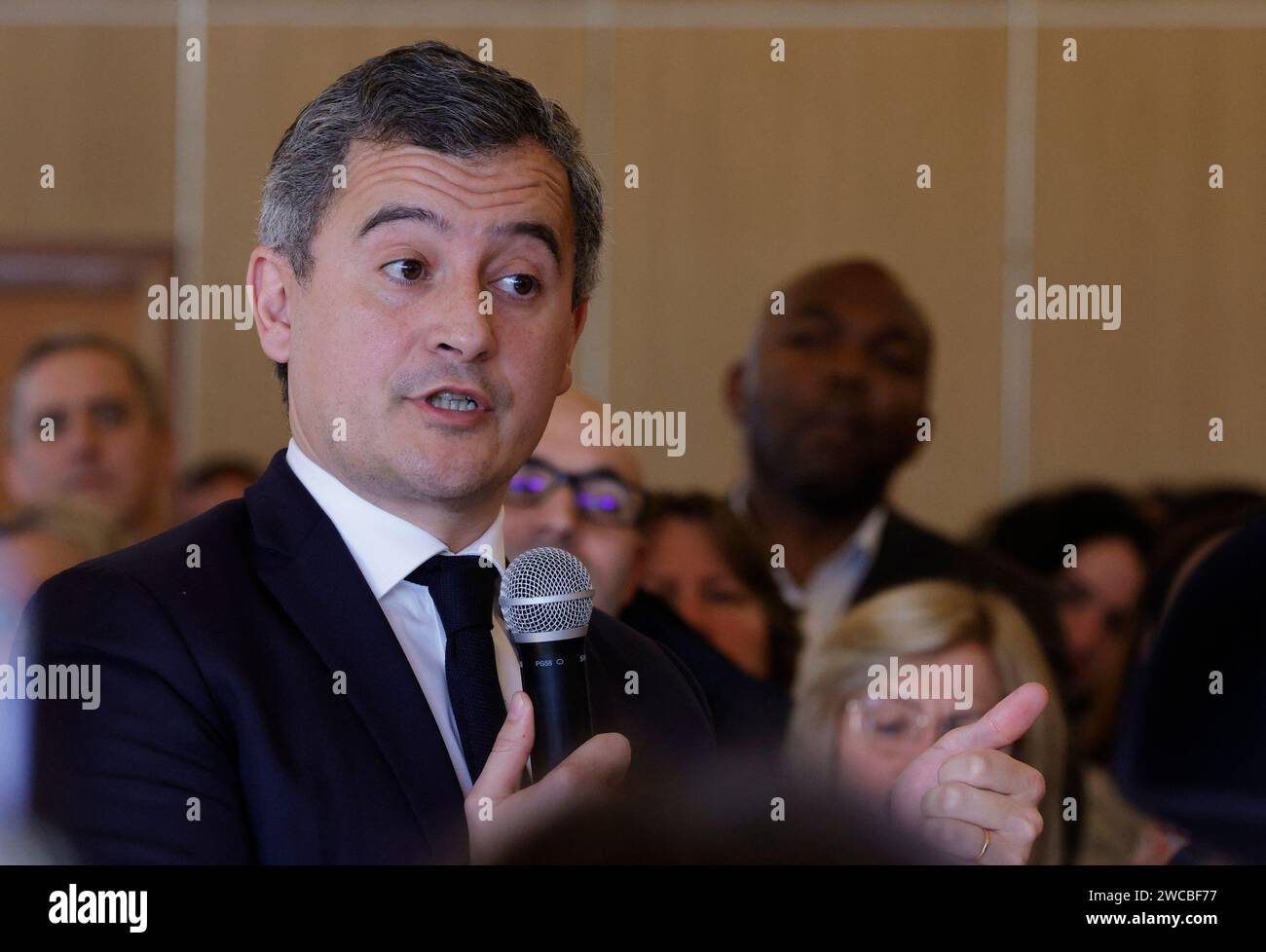 French Interior Minister Gerald Darmanin delivers a speech to employees