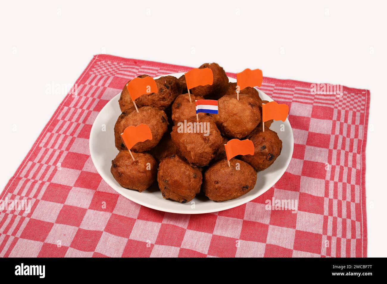 Oliebollen with Dutch flags Stock Photo