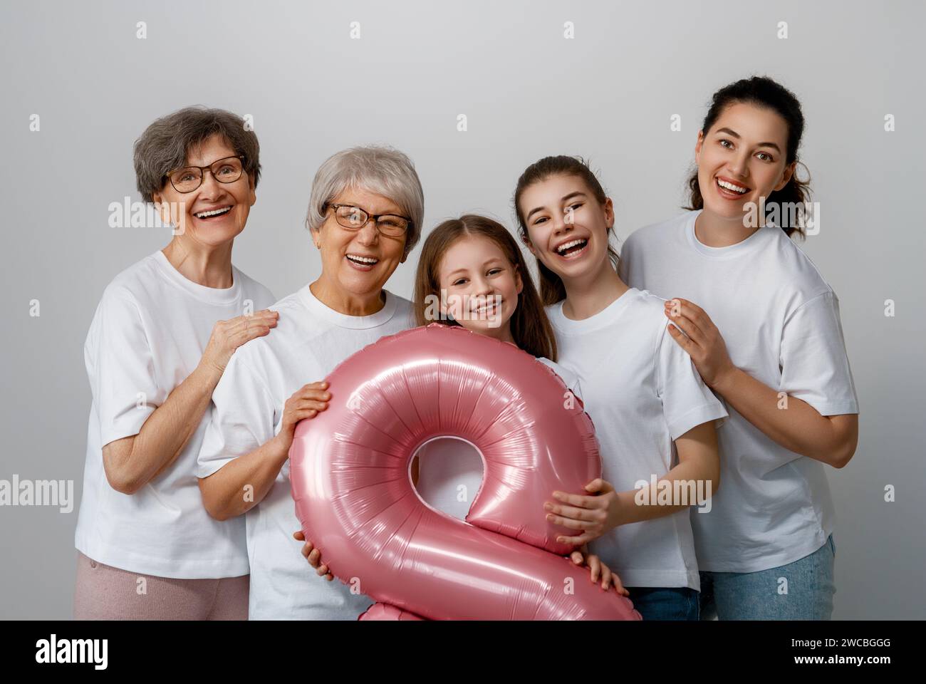 Happy day. Children daughters, mother and grandmothers with air balloon. Family holiday and togetherness. Concept of International Women's Day. Stock Photo