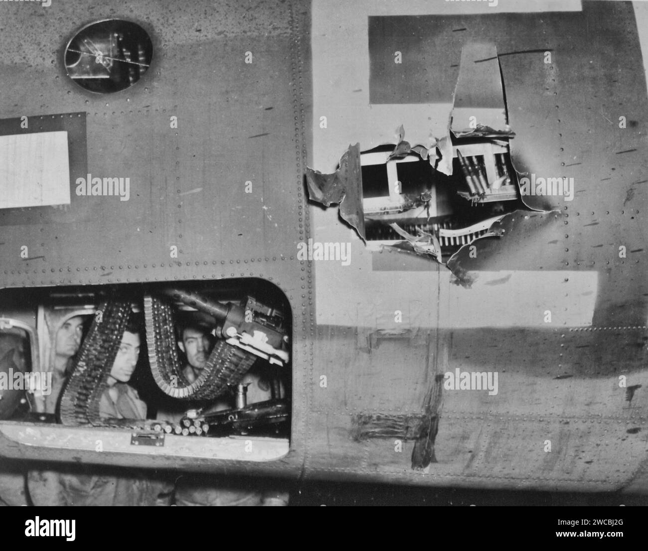 Martin B-26 damaged by flak. They come home when flak damage is no worse than this. U.S. planes, while tough, are not as AA-proof as some manufacturers' advertisements indicate so it pays to take all possible anti-flak measures Stock Photo