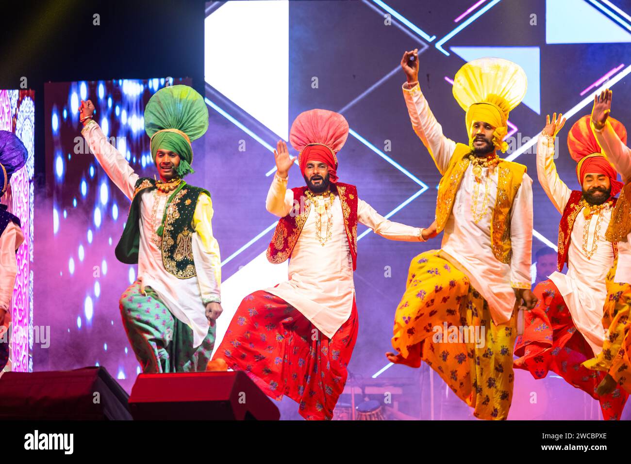 Group of punjabi artists from punjab performing bhangra dance in