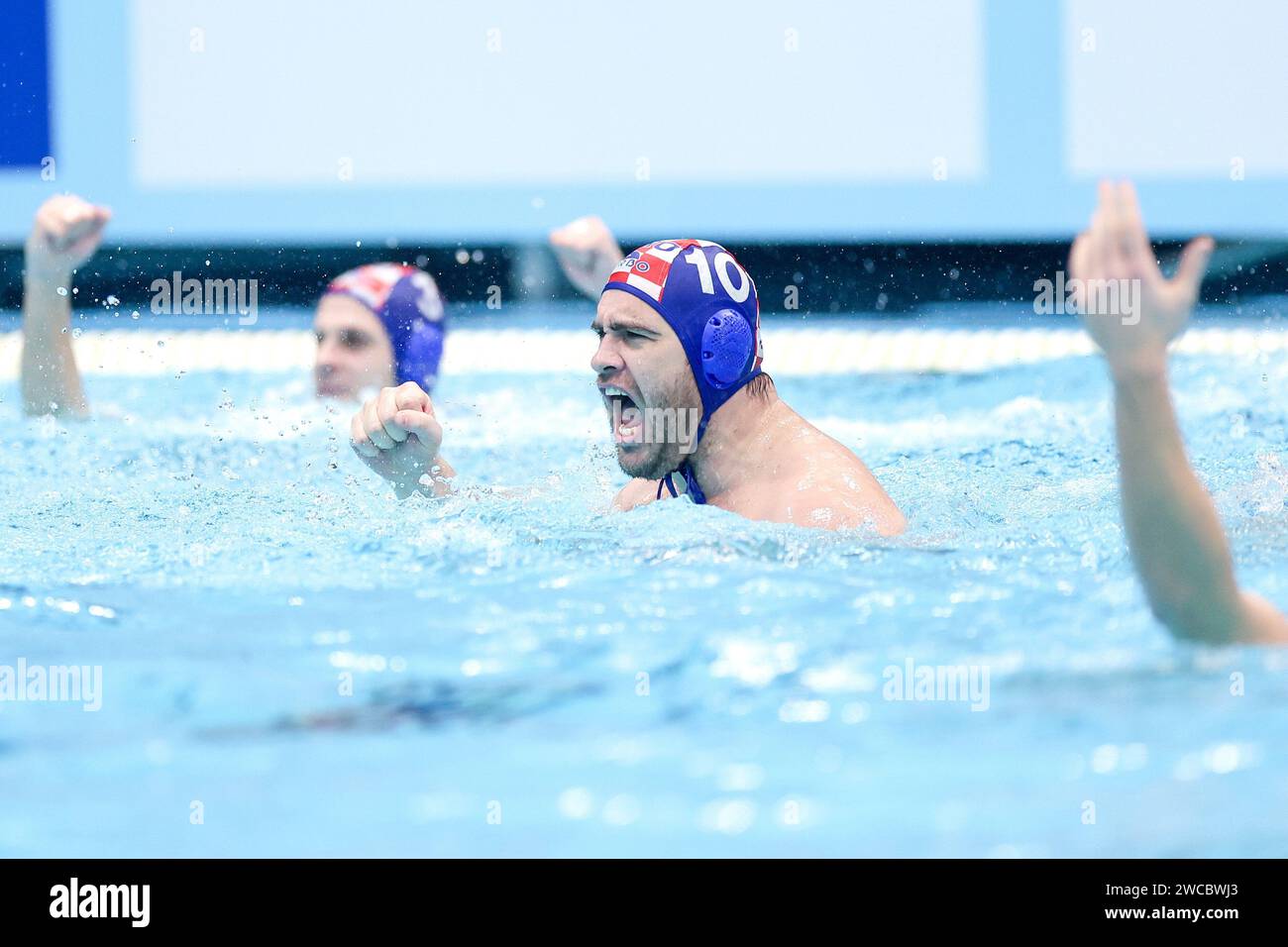 Zagreb, Croatia. 14th Jan, 2024. Josip Vrlic (C) of Croatia celebrates