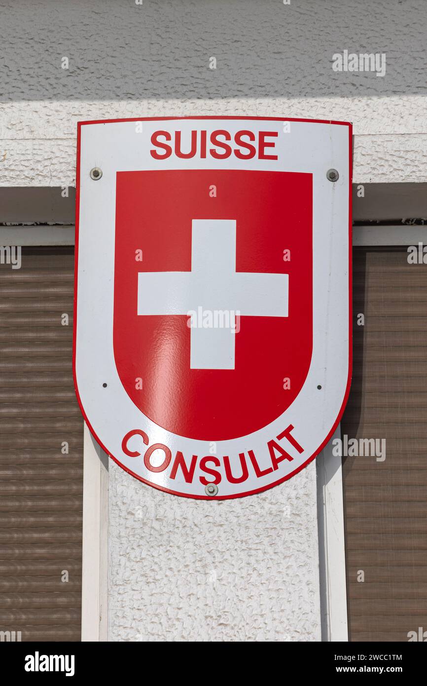 Thessaloniki, Greece - October 22, 2023: Switzerland Coat of Arms Cross Symbol at Suisse Consulat Building at Leof Nikis Street. Stock Photo